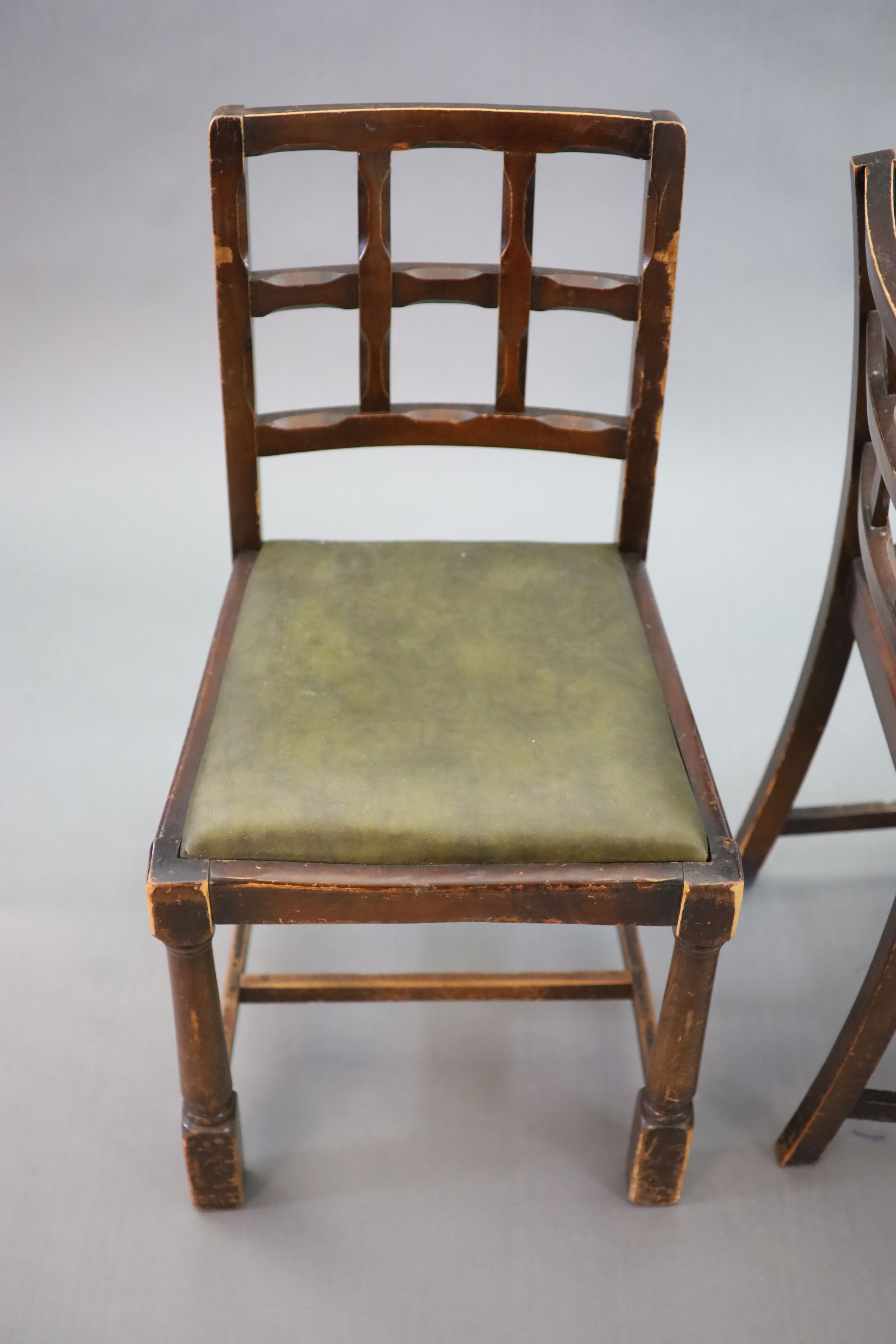 A set of eight early 20th century oak and beech dining chairs